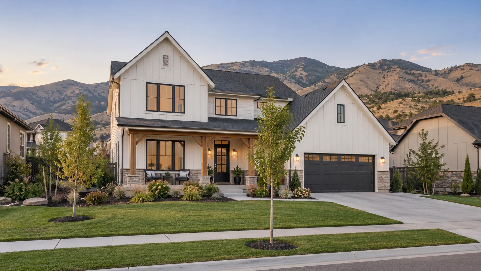 Illustration of a white home beneath mountain foothills at dusk